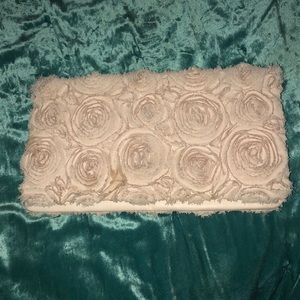 Pale pink clutch